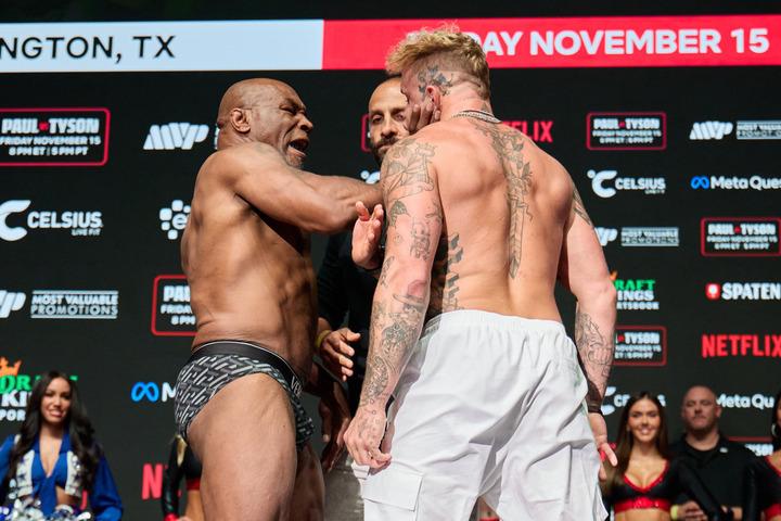 Mike Tyson and Jake Paul hit the scales ahead of Friday spectacle