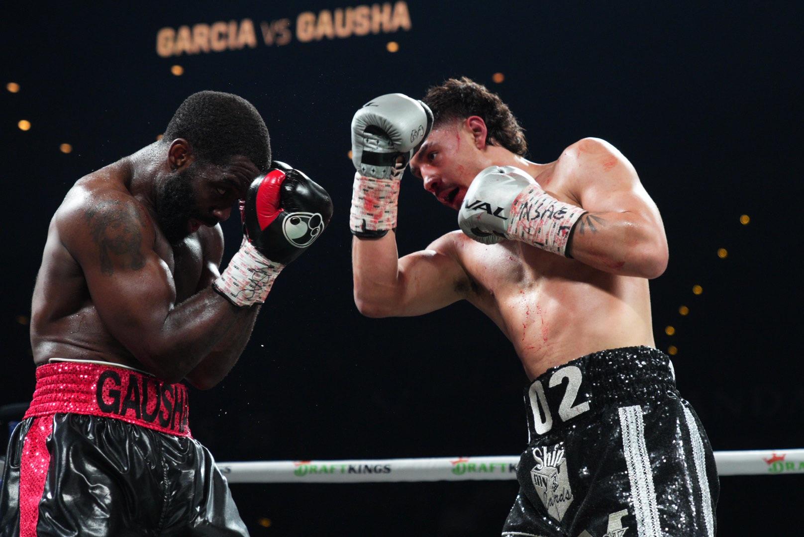 Elijah Garcia fires a right uppercut on Terrell Gausha
