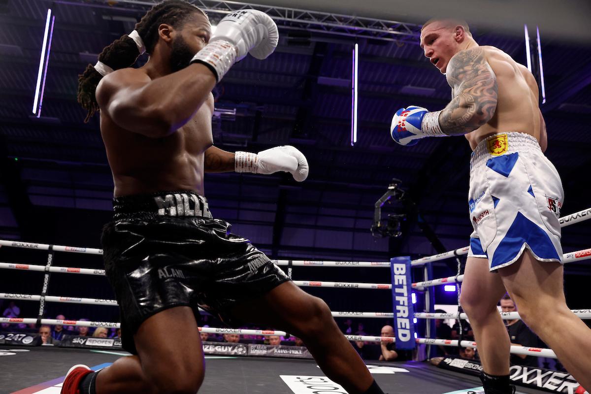 Scott Forrest scores a knockdown of Deevorn Miller.